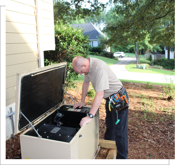 12 A man is working on an outdoor unit.
