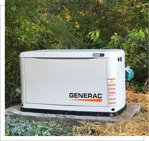 A white generator sitting on top of a pile.
